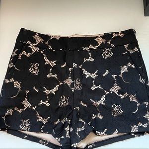 Express mid rise Black and Tan lace shorts